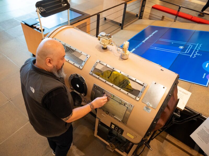 Guest participates in a tactile tour at the Discovery Center.